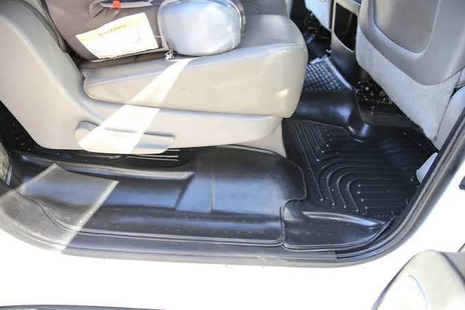 Rust on seat rails and mounting bolts under a front seat