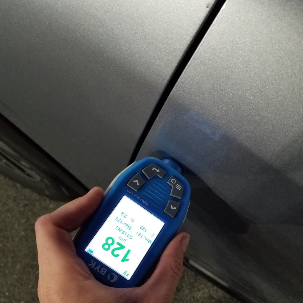Paint-thickness readings revealing repaired panels
